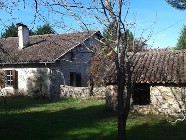 Corps de ferme avec jardin
