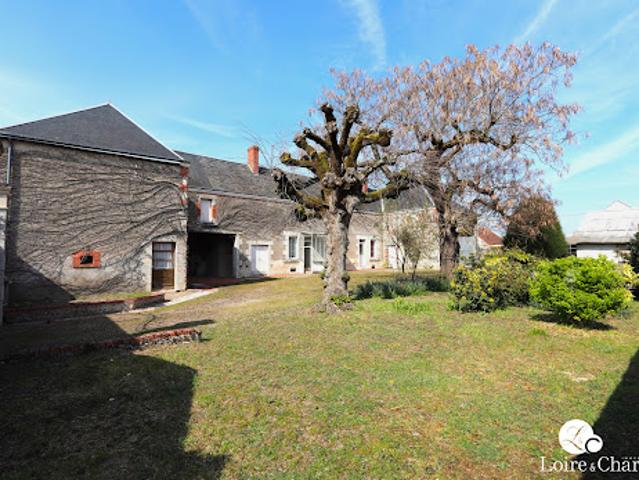 Corps de ferme avec jardin