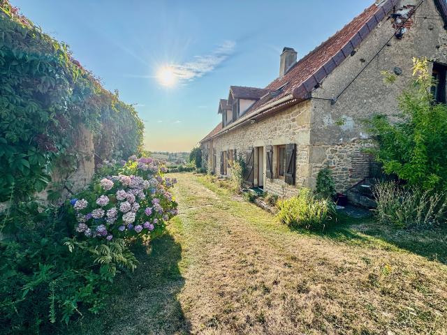 Corps de ferme en pierre restauré