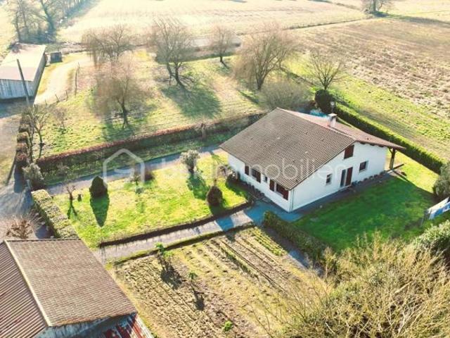 Propriété avec maison, dépendances et 10 ha de terres agricoles planes et irrigables