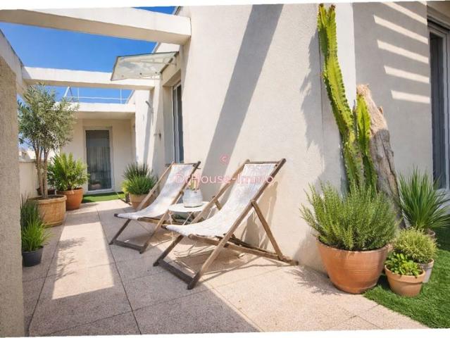 T4 DE 82 M² AVEC TOIT TERRASSE PAYSAGÉ DE 51 M², DOUBLE GARAGE ET PRESTATIONS DE QUALITÉ