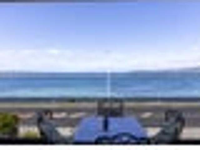 Coveted Lakefront Living with Iconic Lake Views