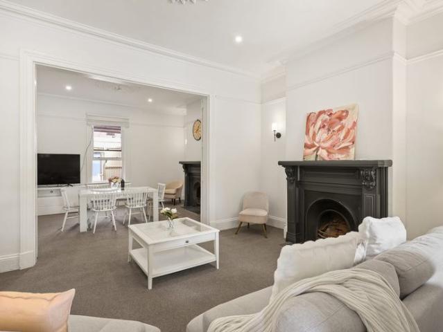 Classic East Melbourne Terrace with Space, Character & Unmatched Convenience