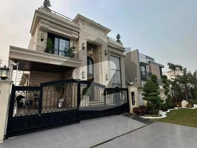 Classic 1 kanal home with pool, gym & rooftop on main road phase 8