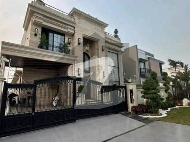 Classic 1 kanal home with pool, gym & rooftop on main road phase 8