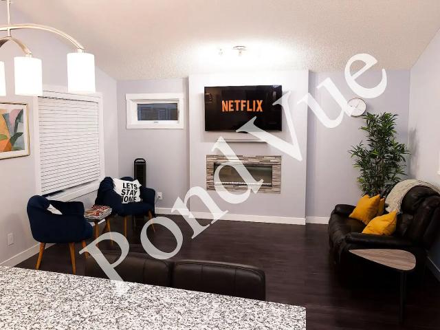 Clean and Cozy Top Floor 3 BED 2 BATH+Private Balcony+Near YEG Airport