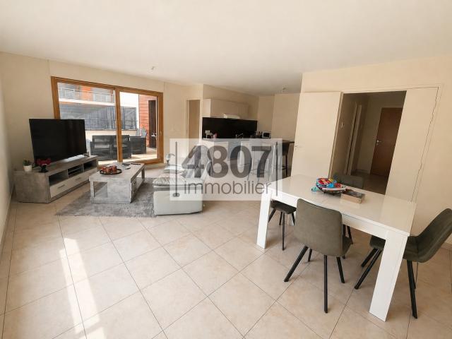 CLUSES Secteur centre ville Spacieux appartement T3 74,42 m2 + cave + garage
