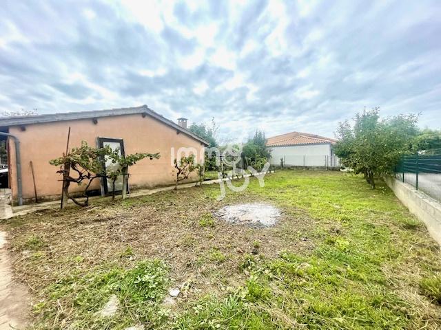 CUGNAUX Terrain à bâtir de 461 m2 non viabilisé avec bâtiment + garage