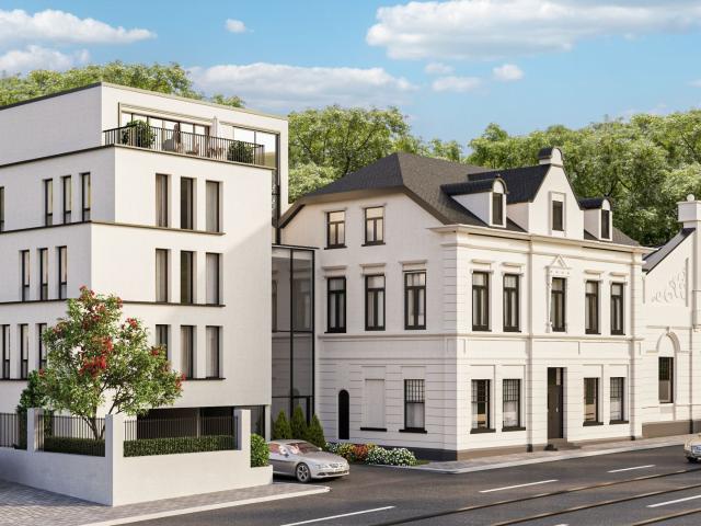 Dachgeschosswohnung mit zwei Balkonen in der denkmalgeschützten Löwenburg