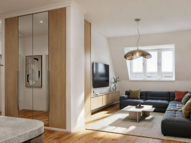 Dachgeschoss mit Neubaustandard im saniertem Altbau!