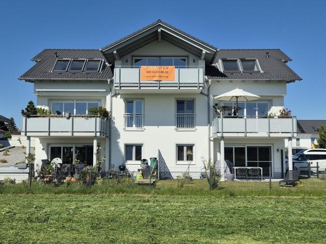 Dachterrassenwohnung mit großer Südterrasse und unverbauter Sicht in die Alpenkette!