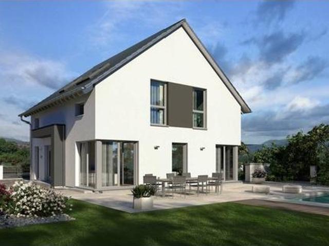 DAS LICHTDURCHFLUTETE FAMILIENHAUS in Traumlage gleich im Grünen und doch zentral