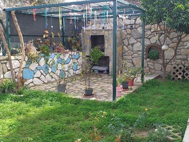 Datça Çomarlık'da kapanmaz manzaralı bahçeli satılık dublex ikiz villa