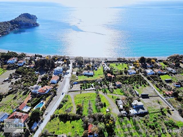 Datça Ovabükü anayol cepheli denize 120 m plan içi 2215 m2 tarla