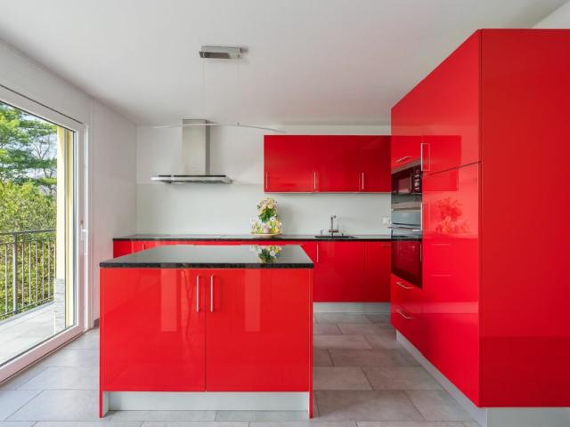 DAVESCO · CASA MODERNA CON GIARDINO E VISTA APERTA SUL LAGO DI LUGANO