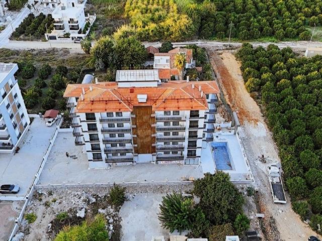 DENİZ MANZARALI HAVUZLU EBEVEYN BANYOLU 1+1 SATILIK DAİRE