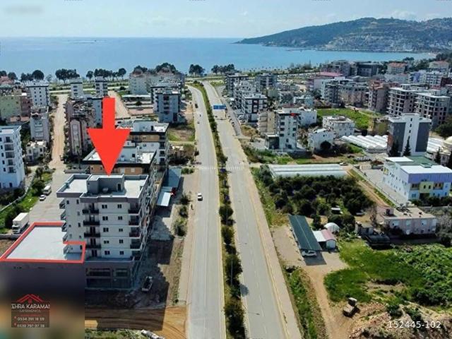 DENİZE 250M DE AYRI MUTFAKLI 100M2 TERASLI 2+1 SATILIK DAİRE