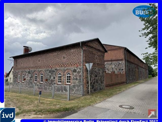 Denkmalgeschütztes Ensemble Beeindruckende Feldsteinscheune und Pension mit großem Potential