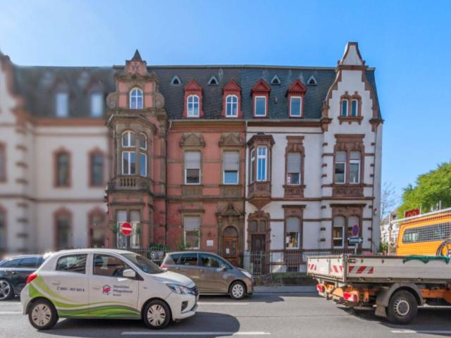 Denkmalgeschütztes Mehrfamilienhaus mit Arztpraxis in zentraler Lage von Trier!