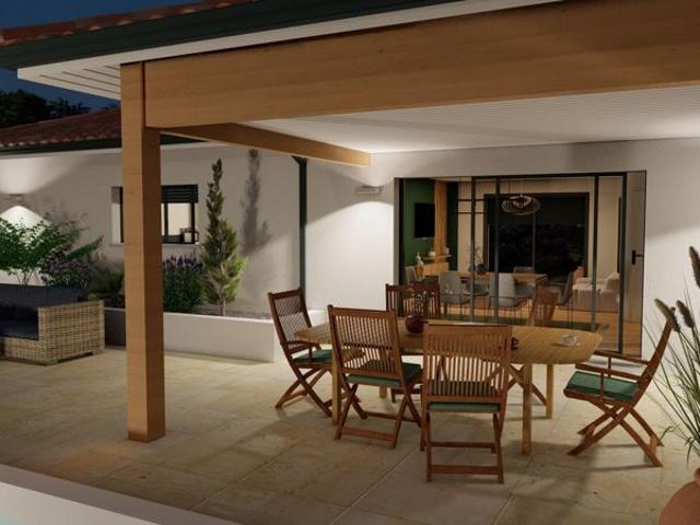 Découvrez votre future maison quatre pièces, avec garage et terrasse couverte à Saint Pierre du Mont