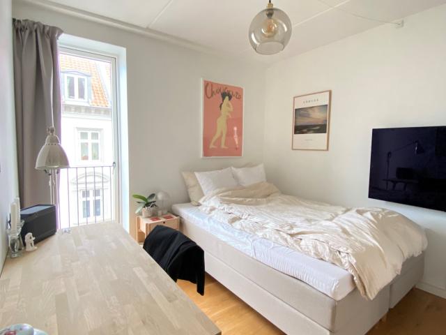 Delevenlig lejlighed beliggende helt i centrum, adgang til tagterrasse