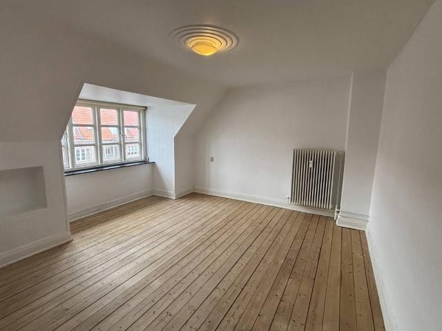 Delevenlig 3 værelses på 96 m2 med charmerende detaljer og grønne kig