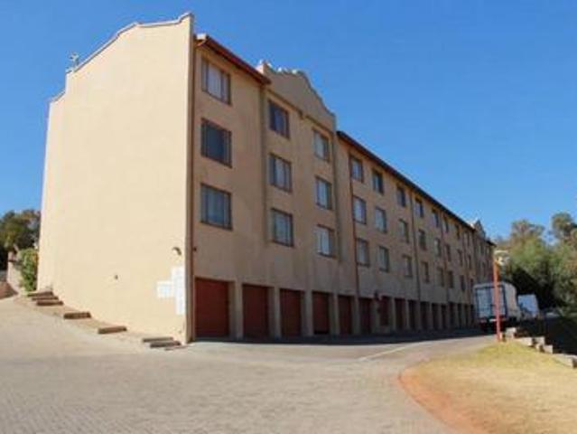 delightful newly tiled 2 bedroom ap.