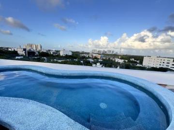 Departamento Nuevo en Venta amueblado y equipado con alberca y vista al mar y Puerto Cancun