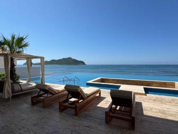 DEPARTAMENTOS EN VENTA A PIE DE PLAYA EN ZONA DORADA MZATLÁN