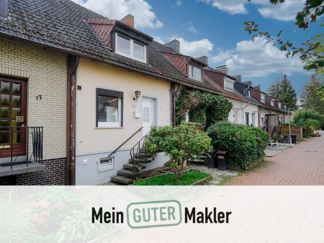 Der Traum vom Eigenheim: bezauberndes Reihenmittelhaus mit Süd Terrasse und Garten in ruhiger Lage