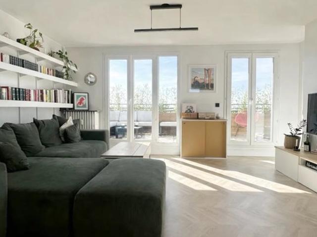 Dernier étage d'exception baigné de lumière avec 60 m2 de te