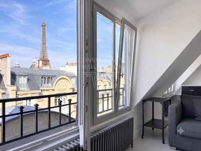 DERNIER ETAGE 3 CHAMBRES VUE TOUR EIFFEL