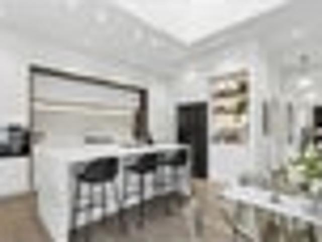 Designer Beachside Living At Its Finest