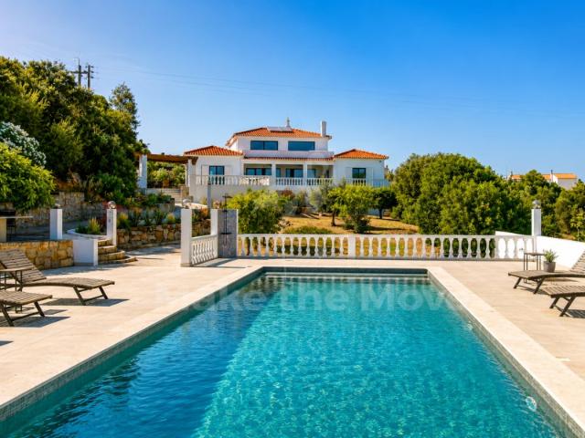 Deslumbrante vivenda com vista ao mar, piscina aquecida, anexo para hóspedes, garagem dupla e ruína independente