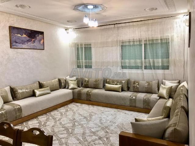 Deux appartements rez de chaussée et sous sol et un local commercial