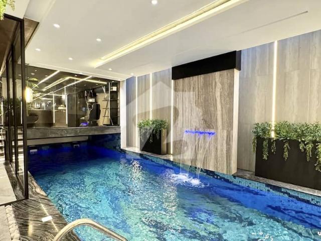 Dha 2 one kanal brand new corner house on main boulevard with swimming pool