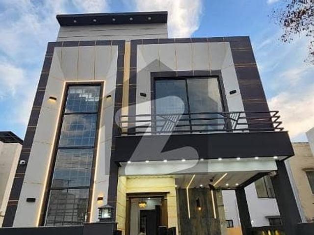 Dha rahbar ph 11 sector 2 5m ultra modern doubel hight window lush house ready for the sale near by park super market and commercial