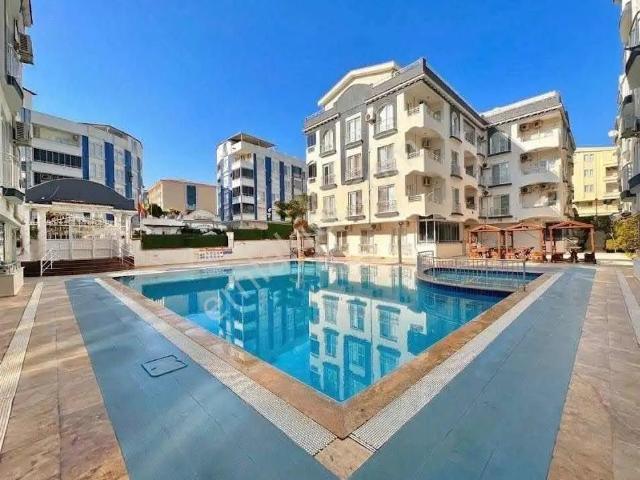 Didim Efeler Mahallesinde Tatil Köyü Konseptinde Satılık 2+1 Dai