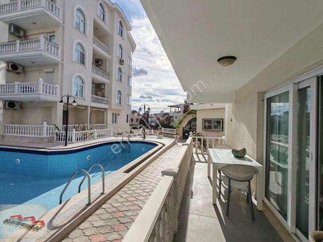 Didim Retürkten  Mavişehirde Havuz Manzaralı Kiralık 3+1 Daire