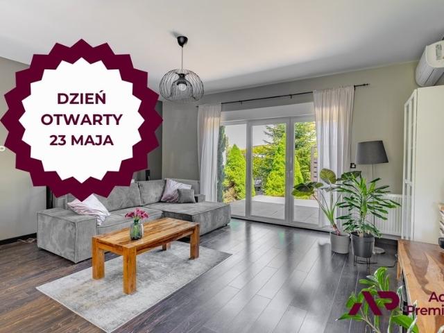 Dom parterowy z ogrodem, fotowoltaiką i pompą ciepła