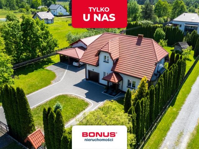 Dom wolnostojący z garażem i dużą działką