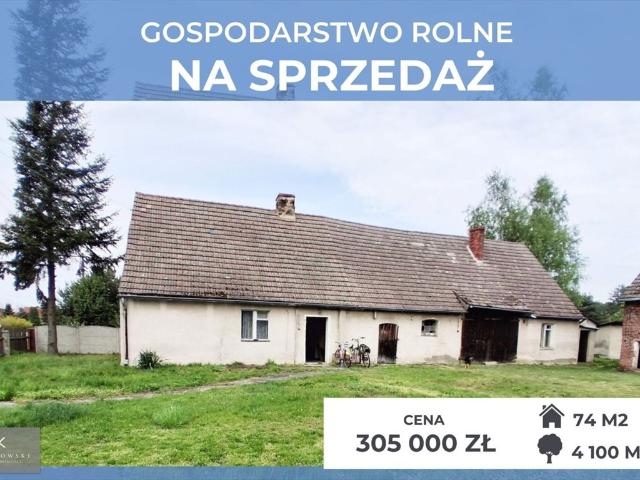 Dom z zabudowaniami na 41 arach w Pokojiu – 74 m2, garaż, stodoła