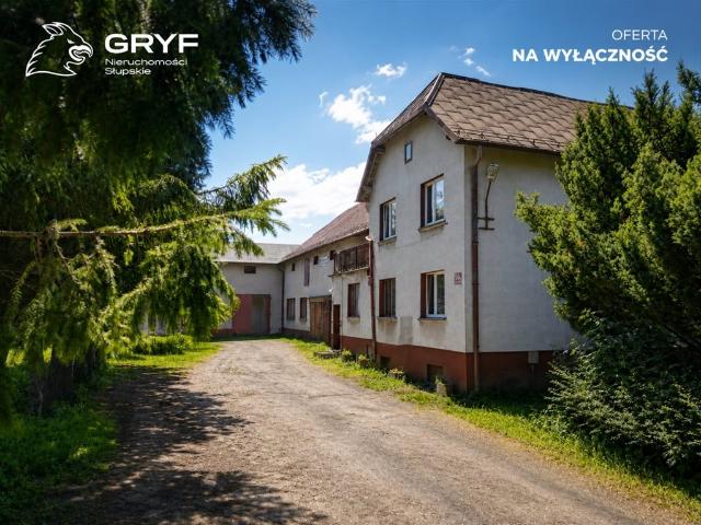 Dom z zapleczem produkcyjno garażowym przy DK 21