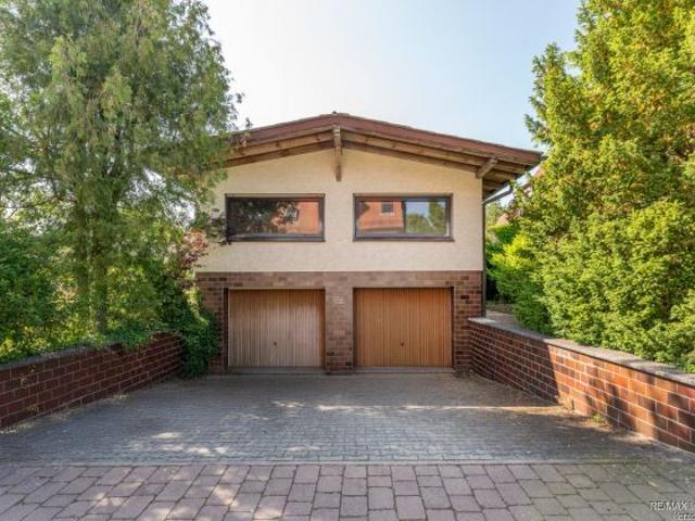 Doppelgarage mit Singlewohnung und Erweiterungspotential