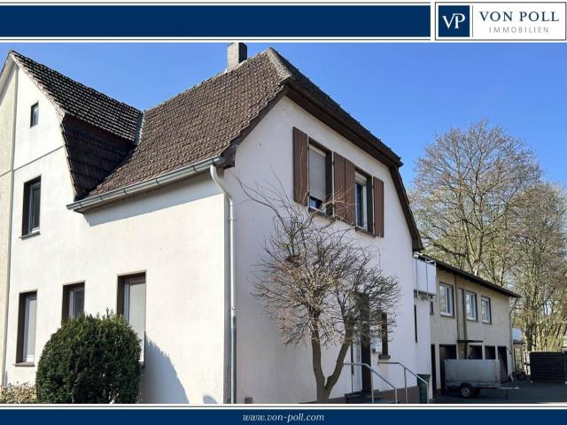 Doppelhaushälfte mit Anbau | 2 WE | voll vermietet | Citynah | 6 Garagen