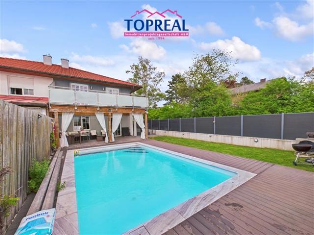 Doppelhaushälfte mit Pool, Garten und hochwertiger Ausstattung – modernes Wohnen in idyllischer Siedlungslage in Wels Pernau
