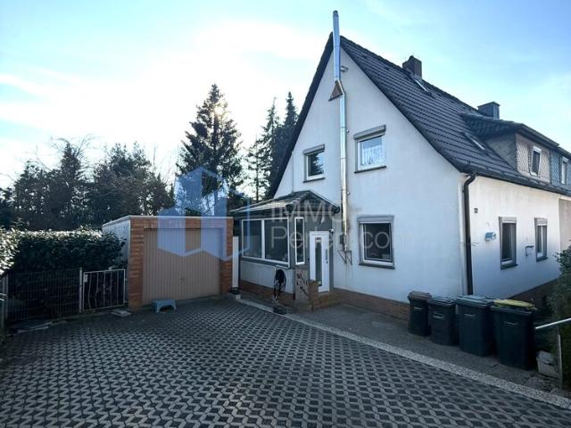 Doppelhaushälfte mit schönem Garten, Garage in familienfreundlicher Lage von Kassel/ Philippinenhof
