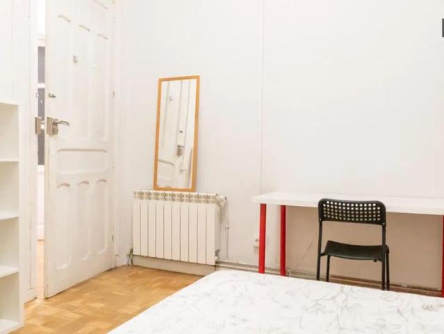 Double bed in Room in a shared 5 bedroom apartment for rent in Argüelles perfect for professionals and students