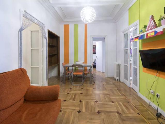 Double bed in Rooms in a colorful and bright seven bedroom apartment