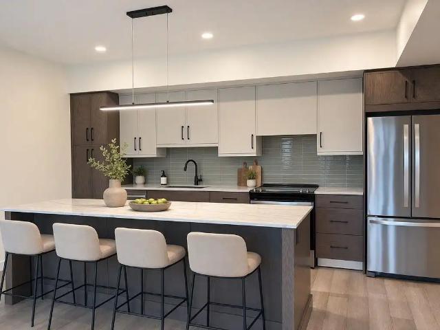Luxury Riverfront Living BRAND NEW 2 Bedroom + Den Condo For Rent